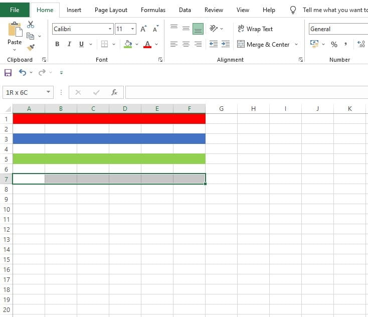 Memilih sel A7 hingga F7 untuk mengganti warna dengan kode HEX di Excel